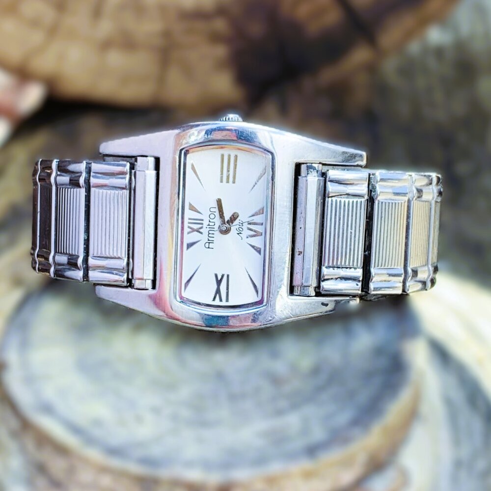 Armitron 75/3213 Unique Silver Tone/Barrel Case/Stretch Band Ladies Watch